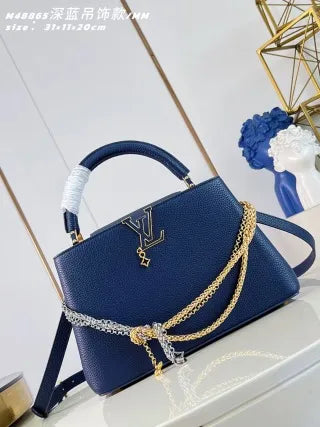 Capucines MM Taurillon Leather 12.2 in Handbag M48865
