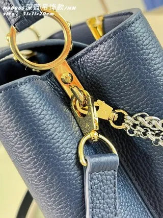 Capucines MM Taurillon Leather 12.2 in Handbag M48865