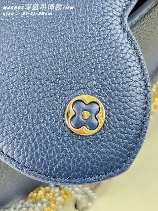 Capucines MM Taurillon Leather 12.2 in Handbag M48865