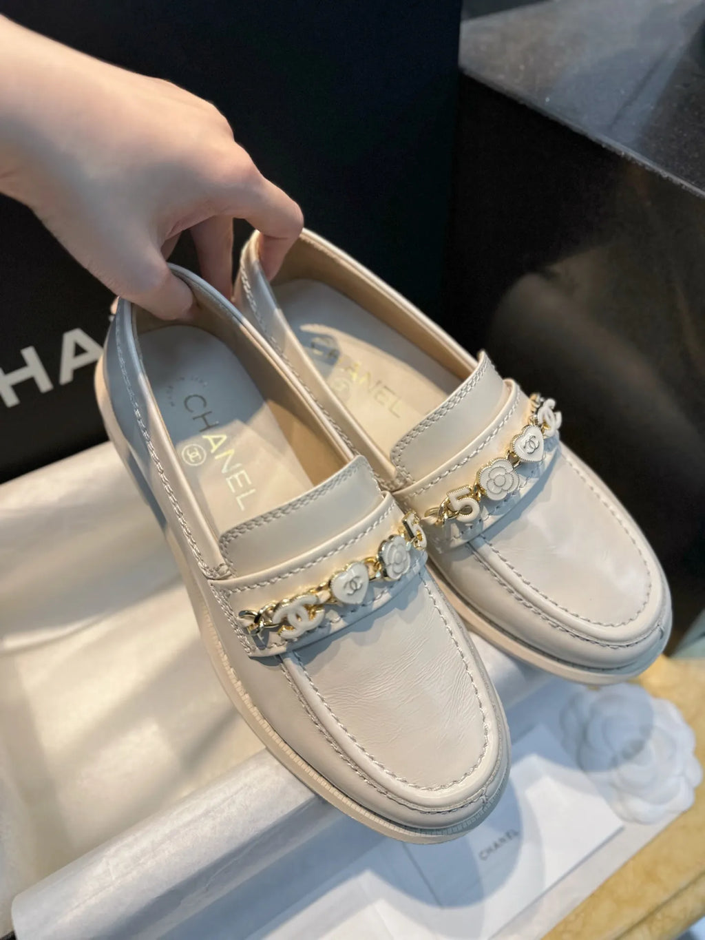 Chanel 24A Enamel Buckle White Loafers 543542