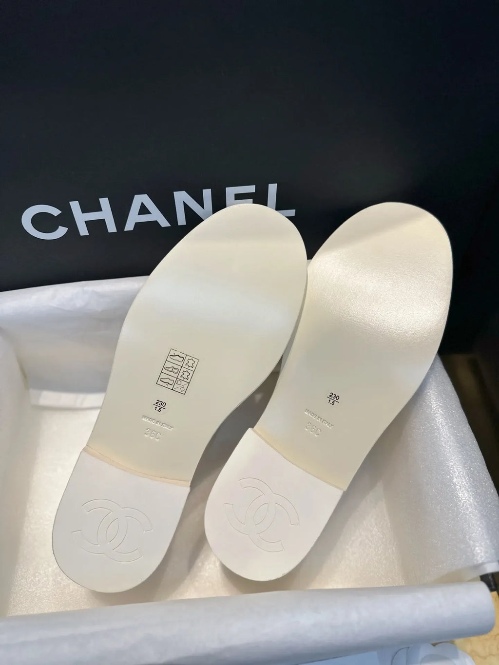 Chanel 24A Enamel Buckle White Loafers 543542