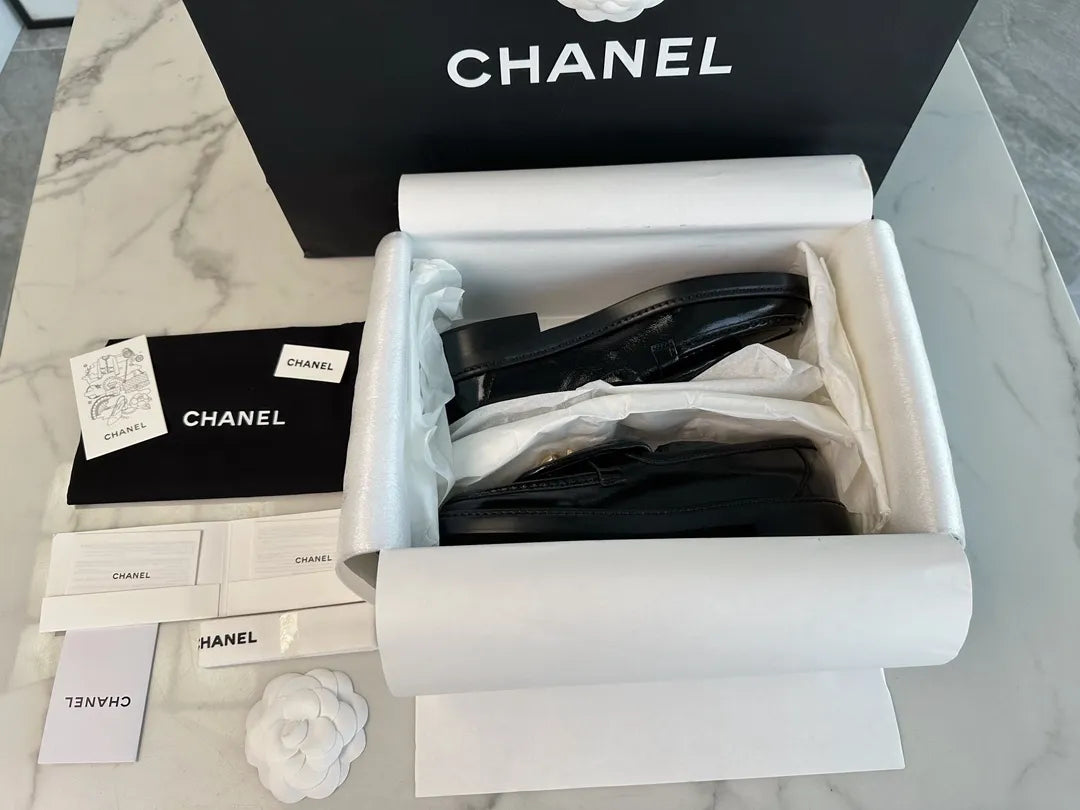 Chanel 24P Crinkled Patent Leather Backpack Loafers 543531