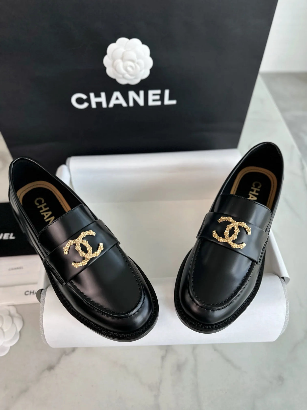 Chanel 24S Metal Camellia Black Loafers 543353