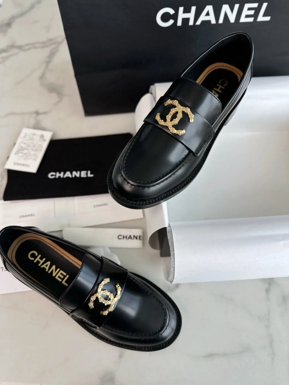 Chanel 24S Metal Camellia Black Loafers 543353