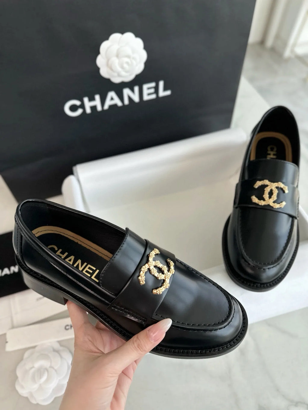 Chanel 24S Metal Camellia Black Loafers 543353