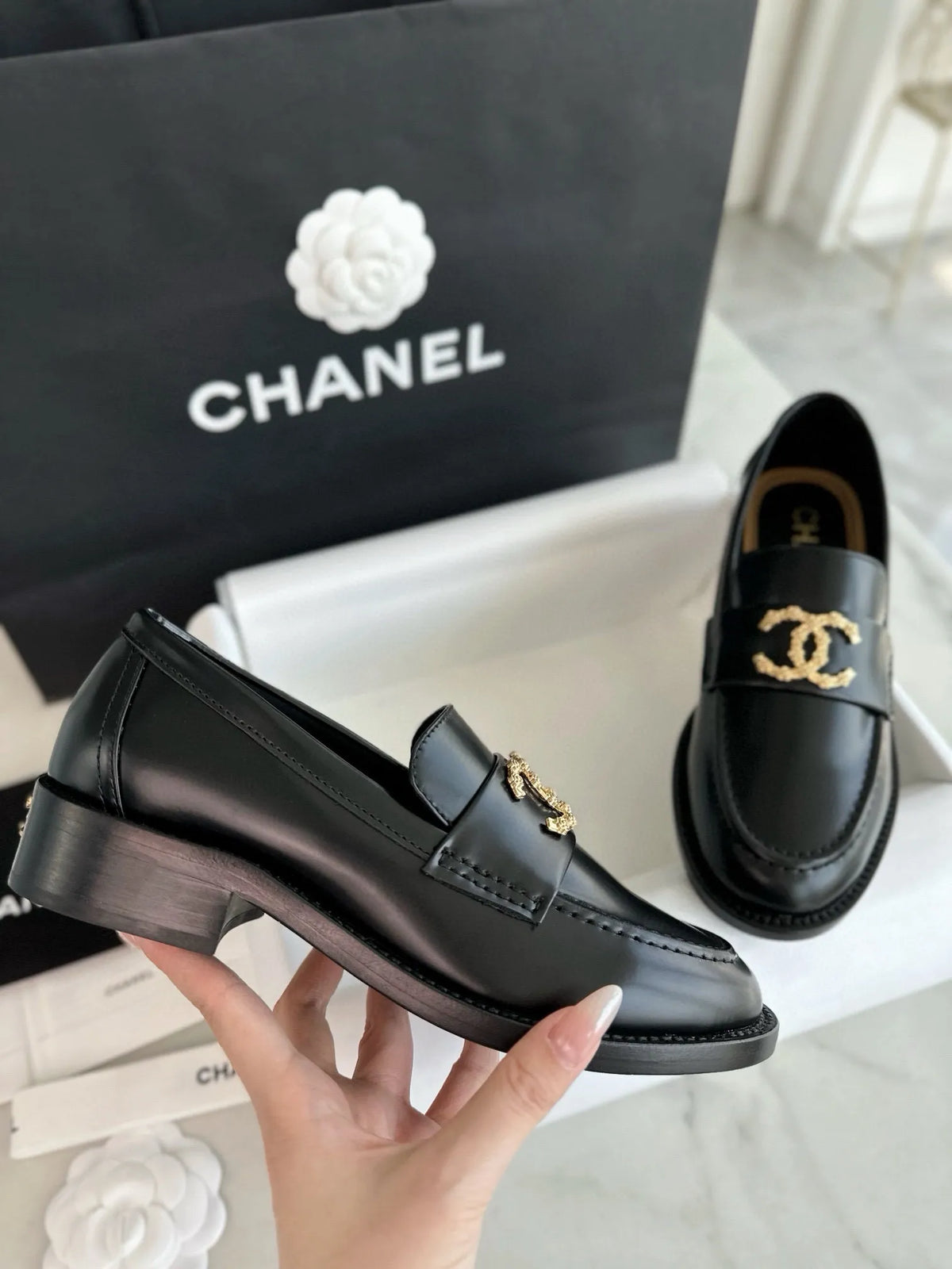 Chanel 24S Metal Camellia Black Loafers 543353