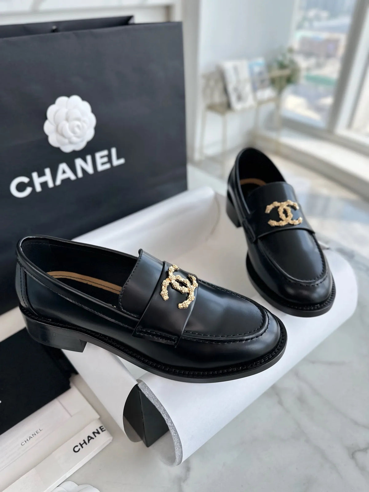 Chanel 24S Metal Camellia Black Loafers 543353
