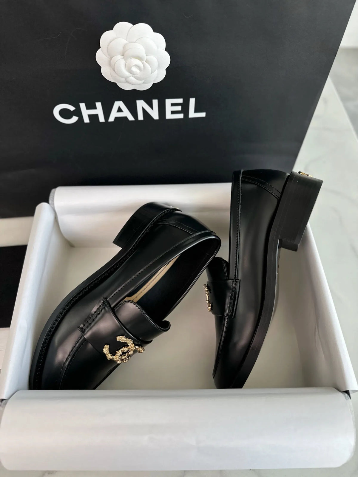 Chanel 24S Metal Camellia Black Loafers 543353