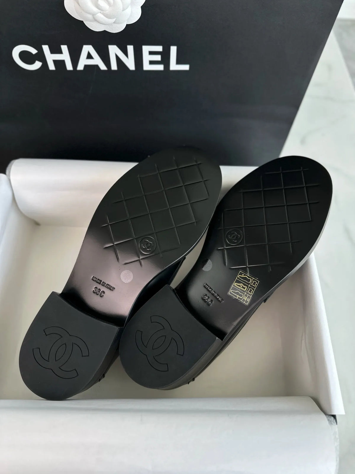 Chanel 24S Metal Camellia Black Loafers 543353
