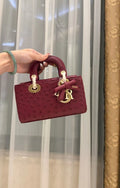 D-Joy Princess Diana Ostrich Leather 7.5 in Handbag 721096