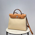 Herbag 31 Canvas and Leather Shoulder Bag Milk Apricot