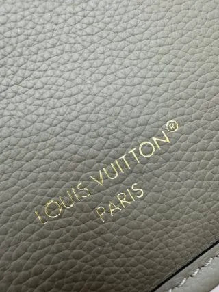 Louis Vuitton Diamond Pattern Leather Bag M12109