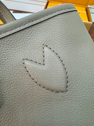 Louis Vuitton Diamond Pattern Leather Bag M12109