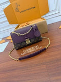 Louis Vuitton Diamond Pattern Leather Bag M28587