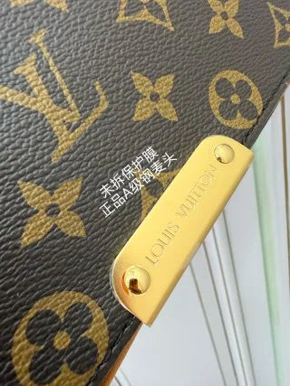 Louis Vuitton Diamond Pattern Leather Bag M2A191