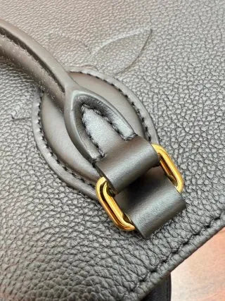 Louis Vuitton Diamond Pattern Leather Bag M45595