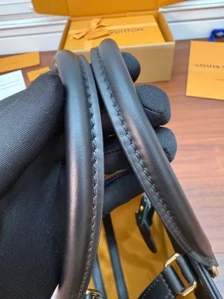 Louis Vuitton Diamond Pattern Leather Bag M45595