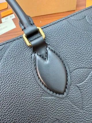 Louis Vuitton Diamond Pattern Leather Bag M45595