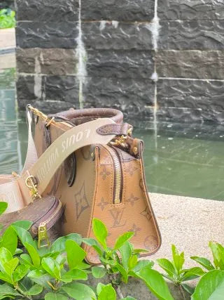 Louis Vuitton LEAN LEAN Leather Handbag M46653