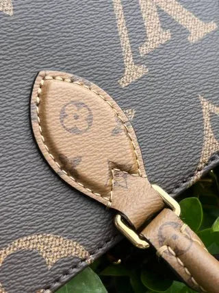 Louis Vuitton LEAN LEAN Leather Handbag M46653
