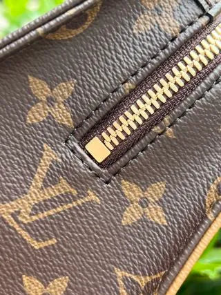 Louis Vuitton LEAN LEAN Leather Handbag M46653
