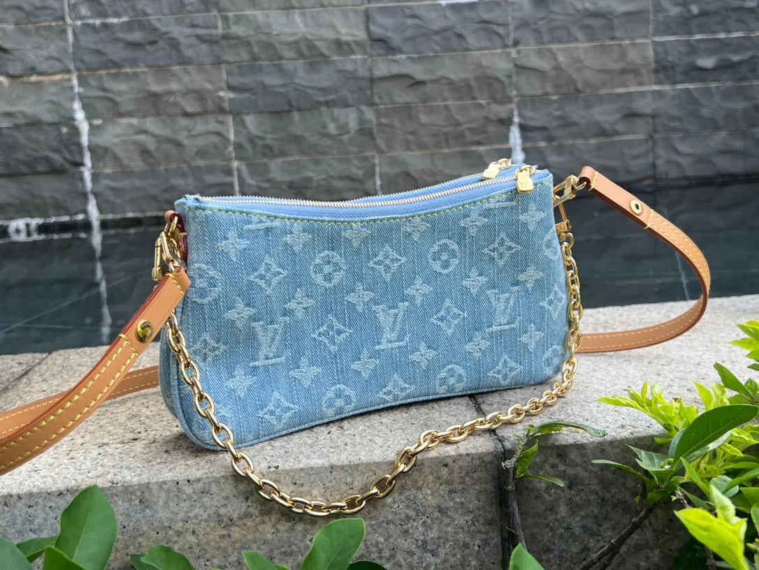 Louis Vuitton Liv Pochette Denim Handbag