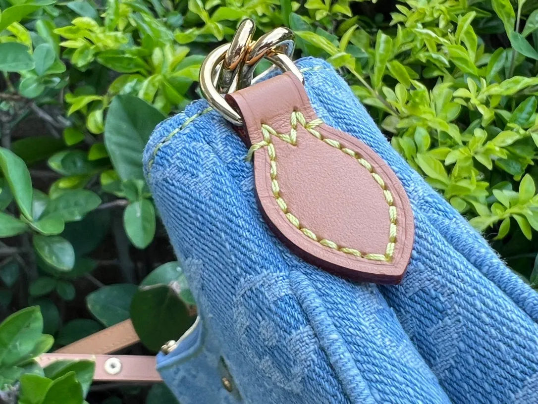 Louis Vuitton Liv Pochette Denim Handbag