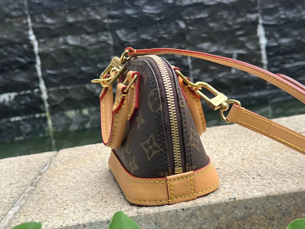 Nano Alma Monogram Canvas Handbag M82717