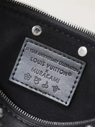 Pochette Accessoires Monogram Handbag M13404