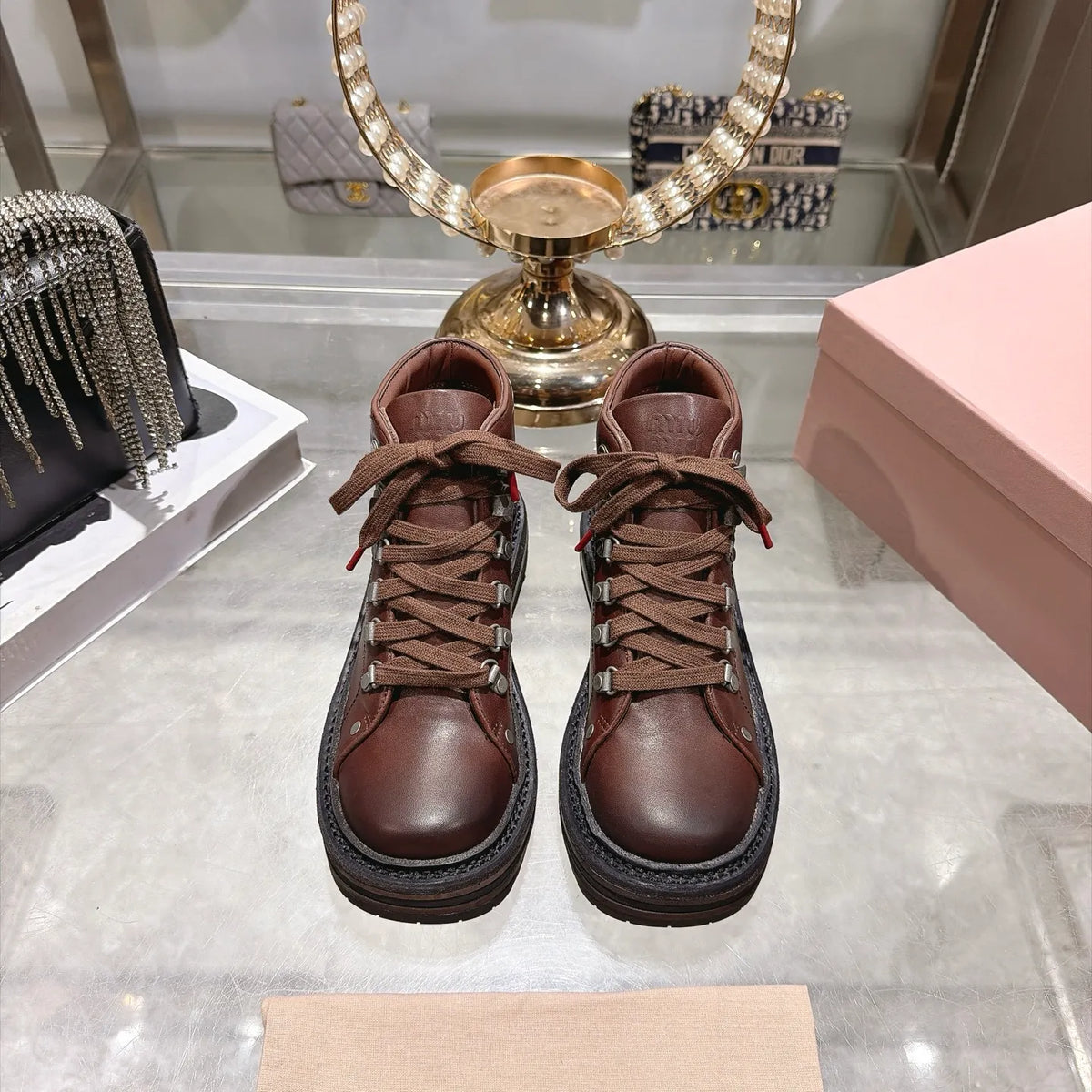Miu Miu Women's Lace-up Motorcycle Boots Distressed Leather 2026