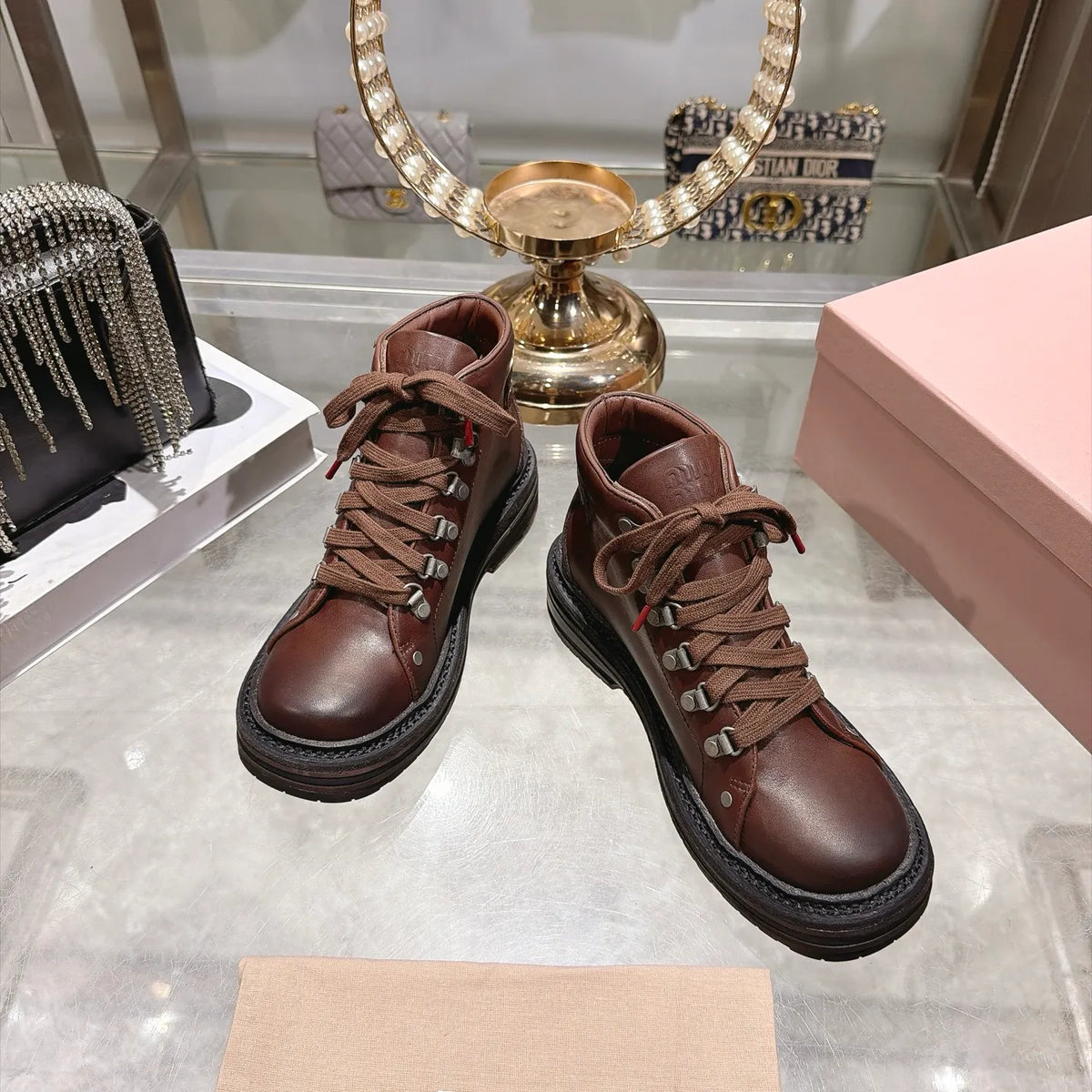 Miu Miu Women's Lace-up Motorcycle Boots Distressed Leather 2026