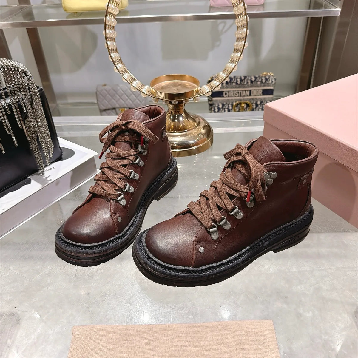 Miu Miu Women's Lace-up Motorcycle Boots Distressed Leather 2026