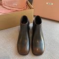 Miu Miu Women's Vintage Distressed Leather Boots 0.8in